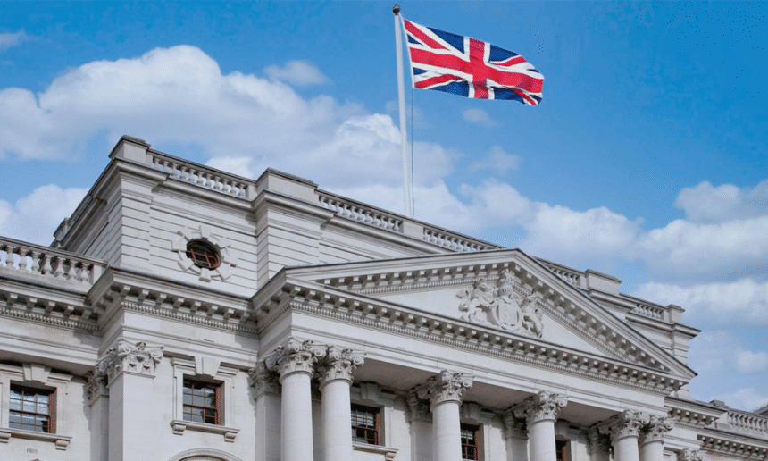 HMRC UK building with UK crypto tax warning letters concept