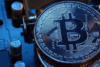 Rows of Bitcoin mining machines illustrating rising Bitcoin miner debt